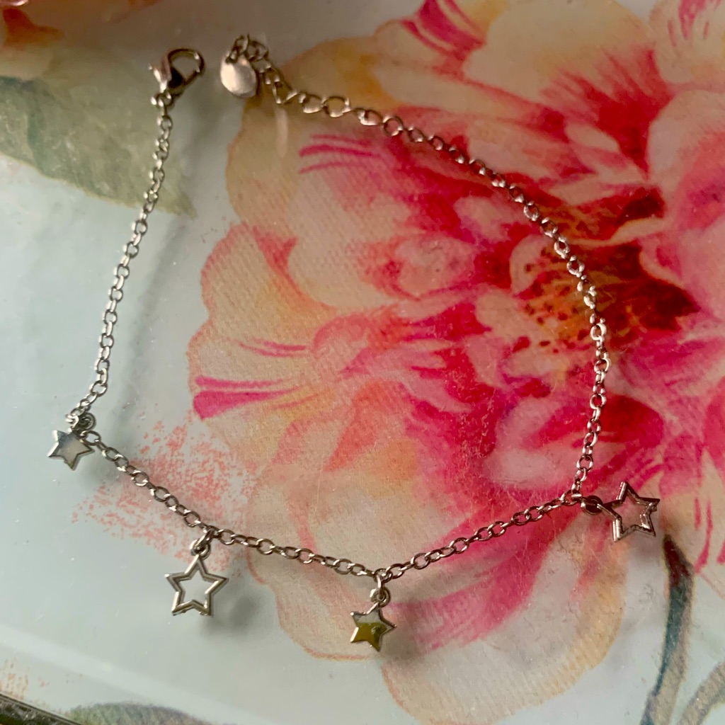 316 Bare Minerals Silver Star Bracelet 12$